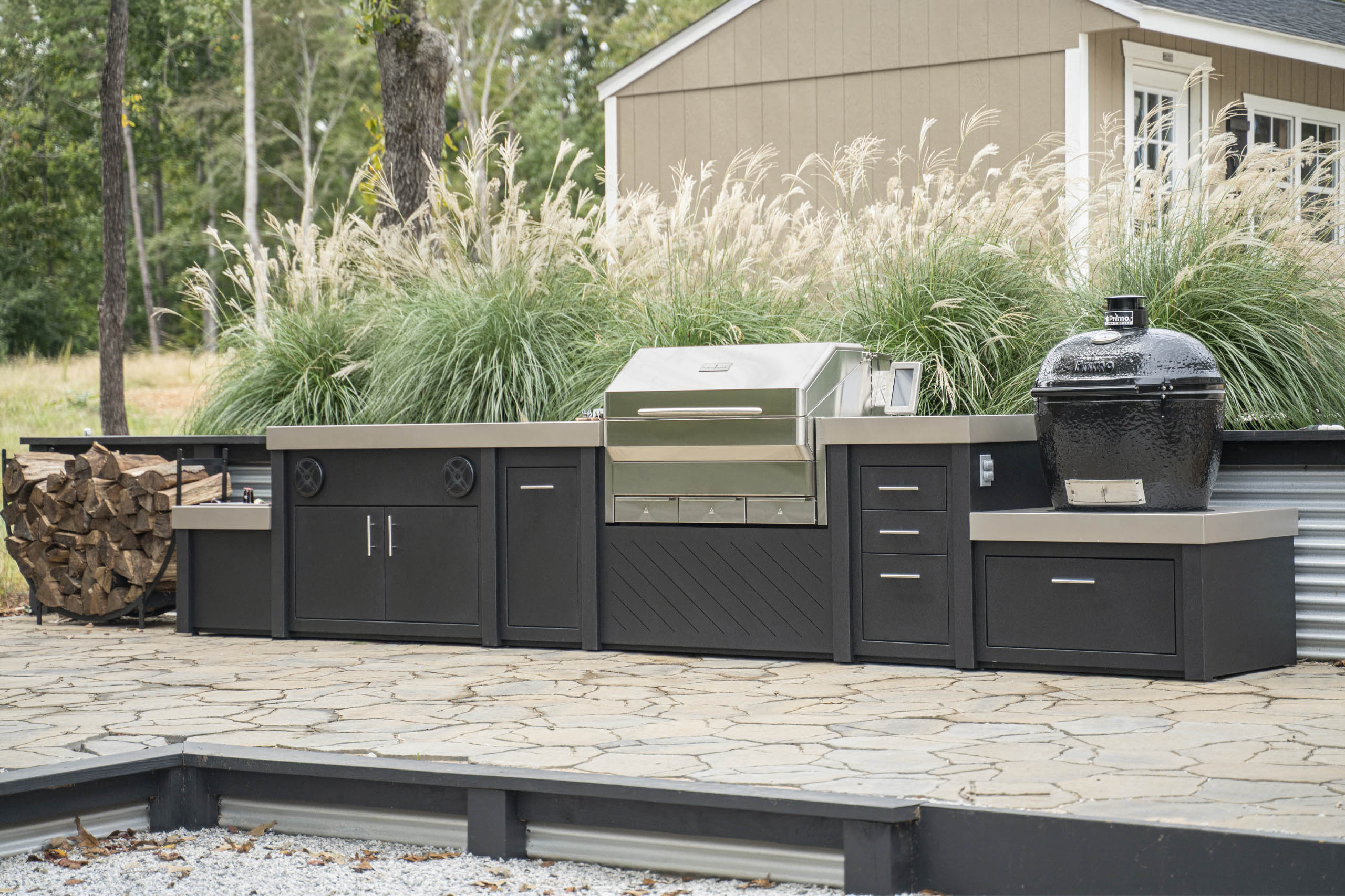 Custom outdoor kitchen island with built-in grill from Clark Propane Plus